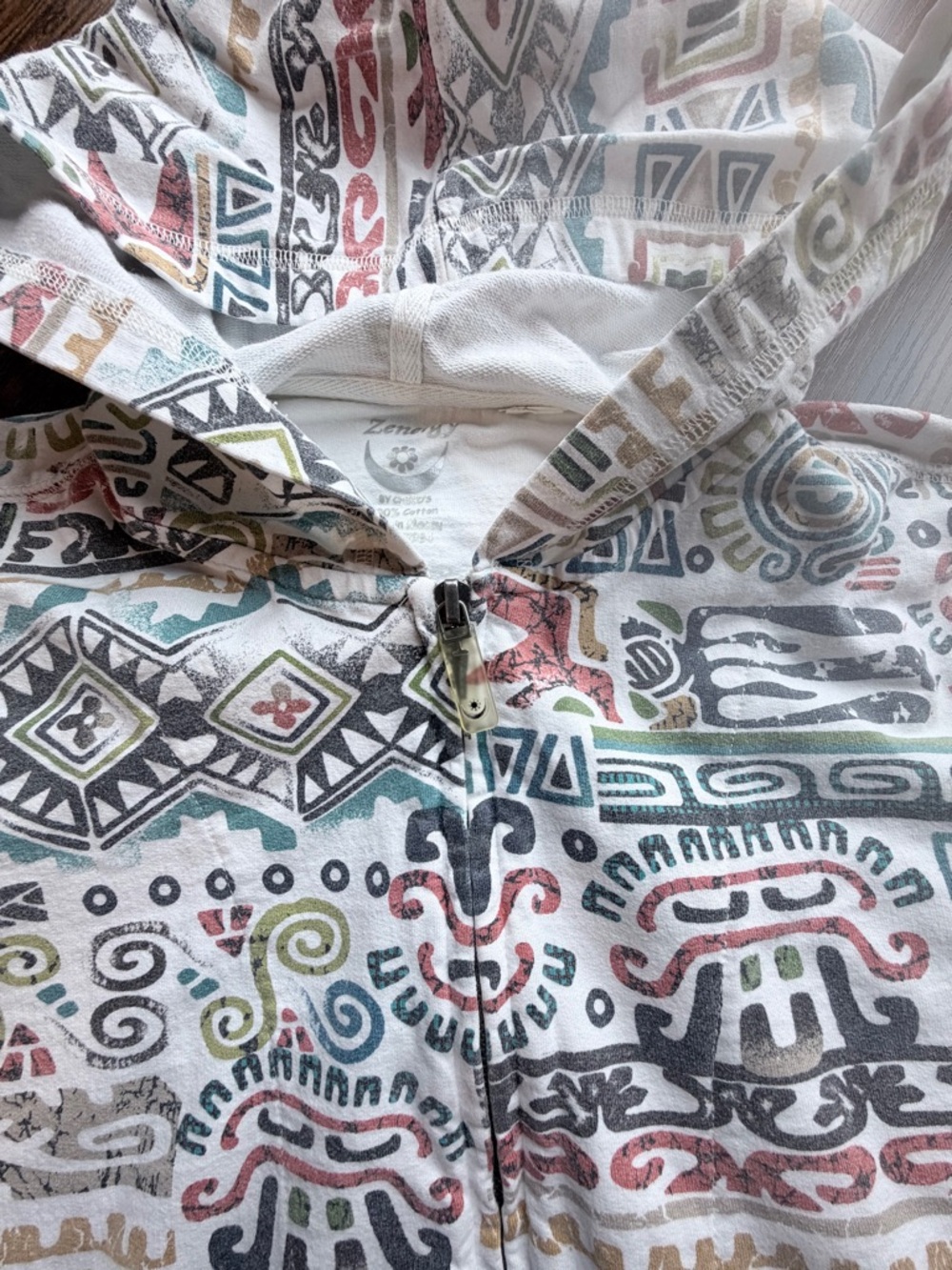 Zenergy by Chico’s zip-up hoodie.  Multi-color print. Made in Macao.  Size 1